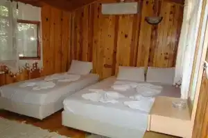 Трехместный бунгало в Чиралы (Олимпос)