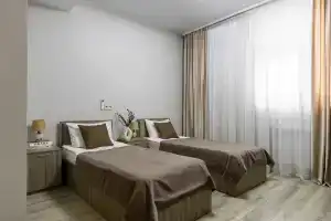 Двухместный номер с 2 отдельными кроватями либо с 1 двуспальной кроватью улучшенный, Тверь