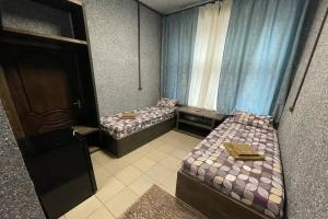 Двухместный номер с 2 отдельными кроватями стандарт