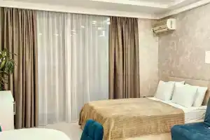 Семейные апартаменты с диваном