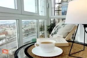 Уютная квартира с панорамным видом на город и Кольский залив, Мурманск