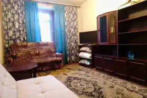 "Уютная квартира в центре города"