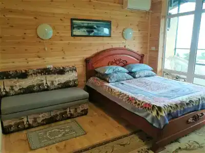 Деревянный коттедж в можжевеловой роще - 150