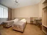 Трёхместный номер улучшенный с видом на город