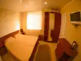 Двухместный номер с 2 отдельными кроватями стандарт