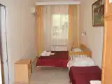 Трёхместный номер стандарт с общим балконом