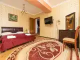 Четырёхместный номер люкс трехкомнатный с кухней и бильярдом