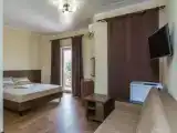 Четырёхместный номер с балконом и ванной