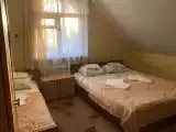 Трёхместный номер с общей ванной комнатой