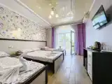 Четырёхместный номер стандарт с балконом