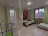 Трёхместный номер фисташковый номер стандарт