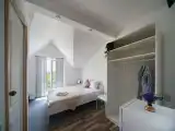 Трёхместный номер с мансардной крышей