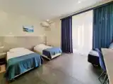 Двухместный номер с 2 отдельными кроватями улучшенный стандарт Sutwin с балконом