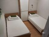 Двухместный номер с 2 отдельными кроватями и удобствами на этаже