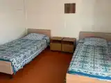 Двухместный номер с 2 отдельными кроватями домик с общими условиями