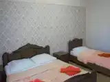 Трёхместный номер люкс с видом на горы