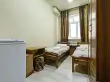 Двухместный номер с 2 отдельными кроватями эконом (с общим сан.узлом)