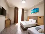 Трёхместный номер стандарт с балконом