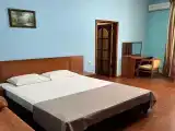 Четырёхместный номер двухкомнатный люкс с видом на бассейн
