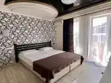 Трёхместный номер делюкс жемчужный