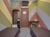 Двухместный номер с 2 отдельными кроватями эконом с общей ванной комнатой