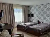 Двухместный номер с 2 отдельными кроватями первая категория, улучшенный с двумя раздельными односпальным