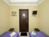 Двухместный номер с 2 отдельными кроватями эконом с общей ванной комнатой