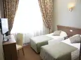 Двухместный номер с 2 отдельными кроватями полулюкс
