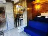 Четырёхместный номер студия с видом на сад