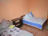 Трёхместный номер с видом на мандариновый сад
