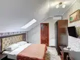 Семейный номер мансардный трехместный без балкона