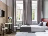 Двухместный номер с 2 отдельными кроватями улучшенный с двуспальной или двумя односпальными кроватями и мини-кухней