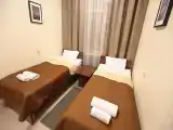 Двухместный номер с 2 отдельными кроватями Эконом, общий сан.узел