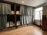 Многоместный смешанный номер место в восьмиместном хостельном общем номере