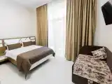Трёхместный номер улучшенный с видом на море