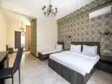 Трёхместный номер с балконом