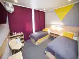 Двухместный номер с 2 отдельными кроватями улучшенный с видом на город
