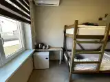 Четырёхместный номер улучшеный с двумя двухъярусными кроватями