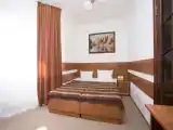 Апартаменты с кухней, спальней, 2 балконами