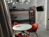 Трёхместный номер Комфорт, двухъярусная кровать + диван