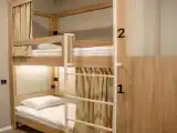 Многоместный женский номер кровать-капсула