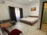 Двухместный номер с 2 отдельными кроватями и доп. местом