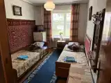 Двухместный номер с 2 отдельными кроватями эконом с общей ванной комнатой