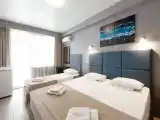 Трёхместный номер улучшенный с балконом