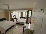 Четырёхместный номер люкс с кухней и санузлом