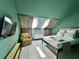 Четырёхместный номер просторный двухкомнатный номер