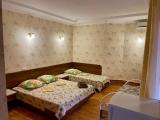Четырёхместный номер Номер люкс с четырьмя односпальными кроватями