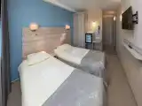 Двухместный номер с 2 отдельными кроватями улучшенный