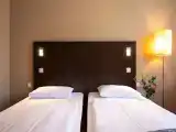 Двухместный номер с 2 отдельными кроватями стандарт