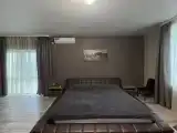 Трёхместный номер люкс с видом на горы